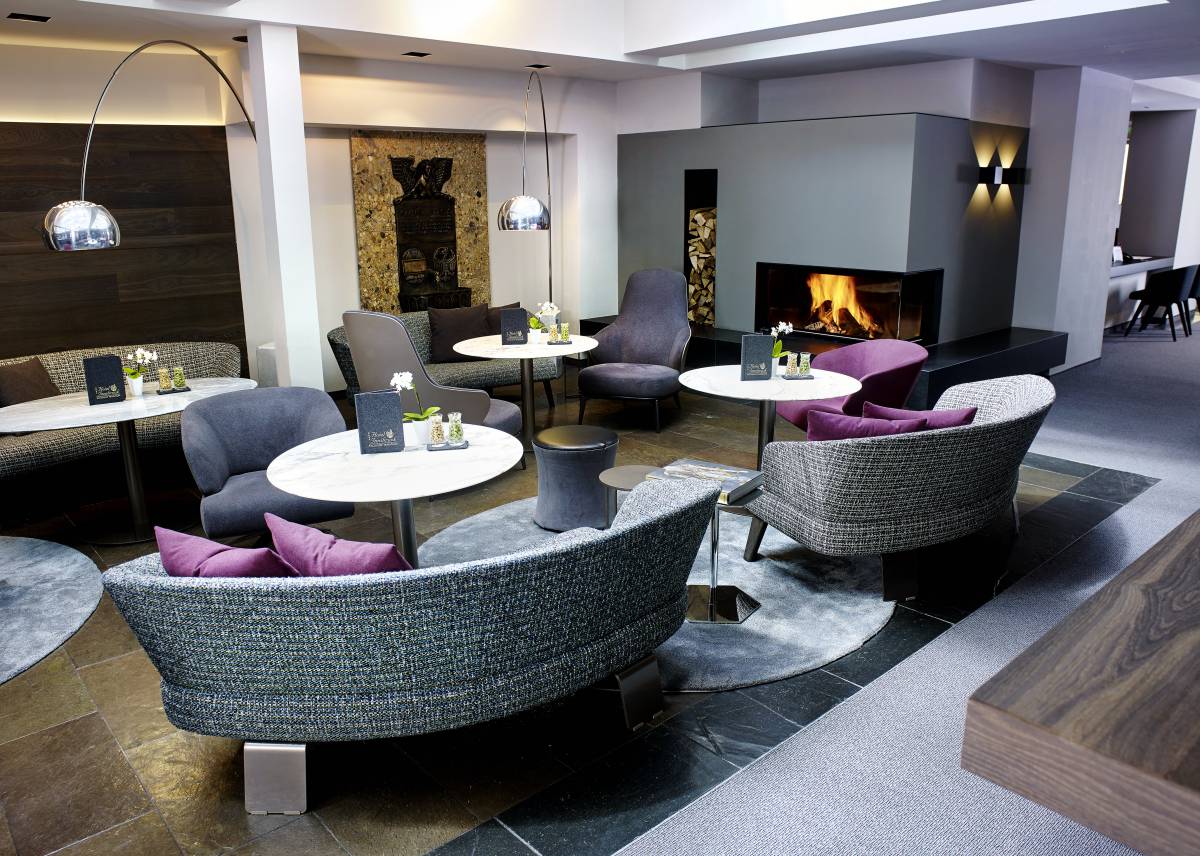 Lounge Minotti con camino dell'Hotel das Innsbruck #1